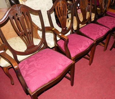 Lot 1430 - A set of seven mahogany Heppelwhite style...