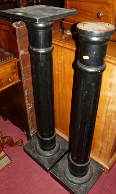Lot 1449 - A pair of ebonised turned and fluted pedestal...