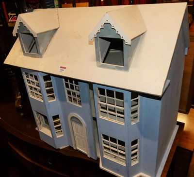 Lot 1466 - A painted three-storey dolls house with sundry...