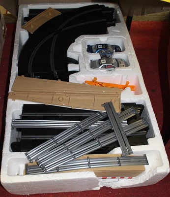Lot 1526 - Three various boxed Scalextric racing gift...