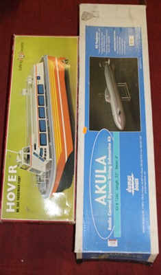 Lot 1548 - Two radio controlled boat kits to include a...