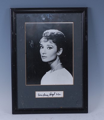 Lot 1194 - Audrey Hepburn, (1929-1993), a 23 x 17cm black...
