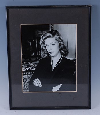 Lot 1195 - Lauren Bacall, (1924-2014), a 24 x 19cm black...
