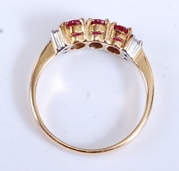 Lot 2166 - A yellow metal, ruby and diamond dress ring,...