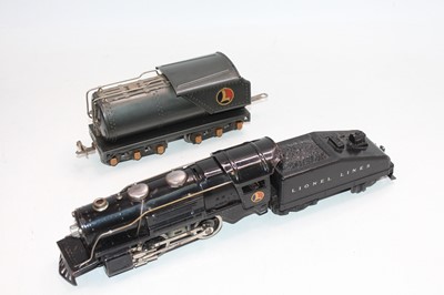 Lot 379 - Three Lionel items: 2-4-2 loco missing both...