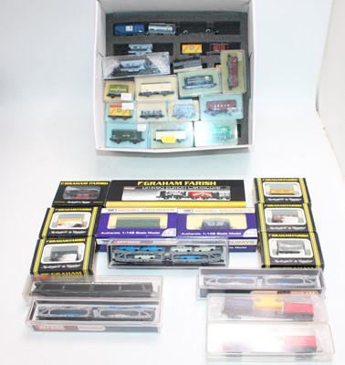 Lot 664 - Tray of approx 58 N gauge goods wagons by Peco,...