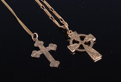 Lot 304 - Two cross pendants, being a 9ct yellow gold...
