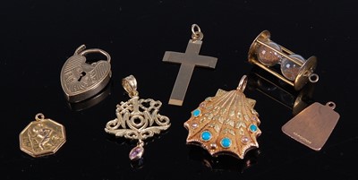 Lot 307 - Various pendants, to include a yellow metal...