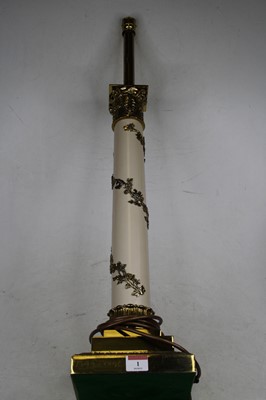 Lot 1 - A 20th century brass table lamp in the form of...
