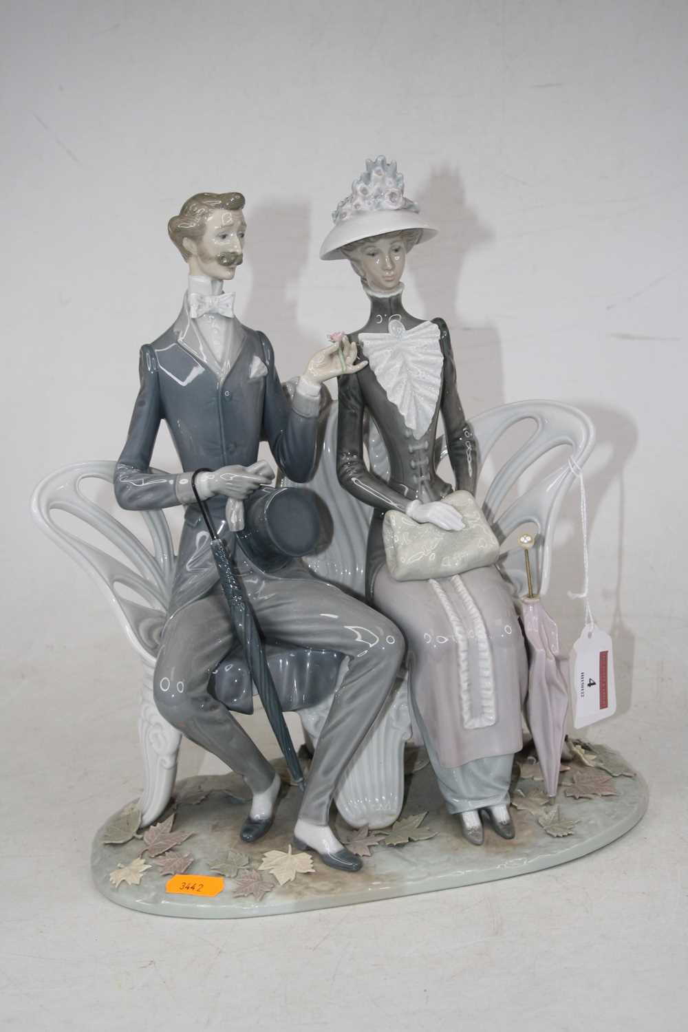 Lot 4 - A Lladro porcelain figure group of a couple...