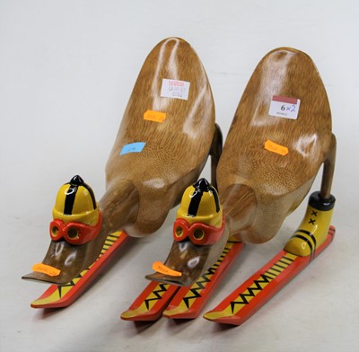 Lot 6 - A pair of carved bamboo models of ducks on...