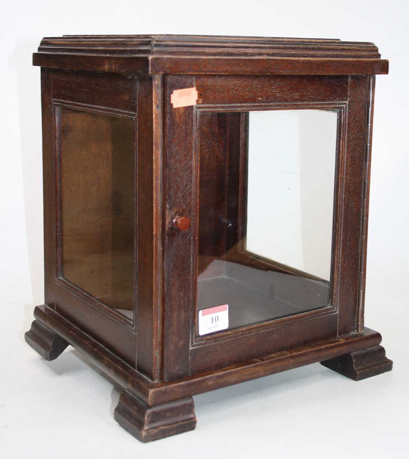 Lot 10 - A 20th century mahogany glazed table top...