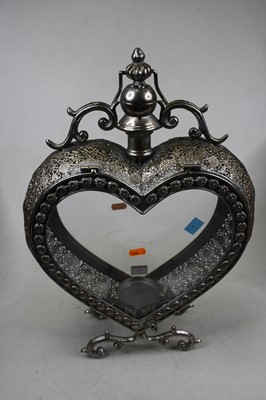 Lot 13 - A contemporary metal heart shaped lantern,...