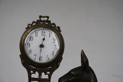 Lot 39 - A 20th century bronze novelty mystery clock,...
