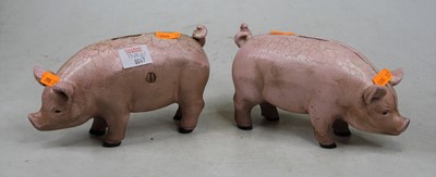 Lot 47 - A pair of painted cast iron piggy-banks, h.10cm