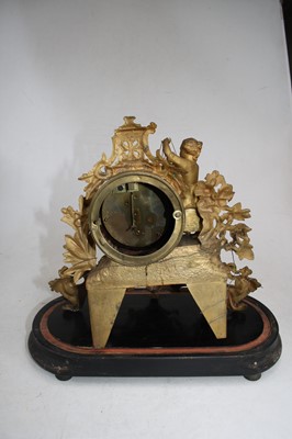 Lot 54 - A 19th century French gilt metal mantel clock,...