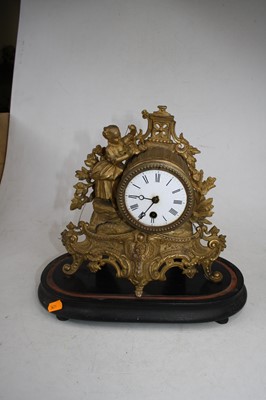 Lot 54 - A 19th century French gilt metal mantel clock,...