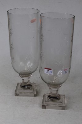 Lot 55 - A pair of contemporary glass hurricane lamps,...