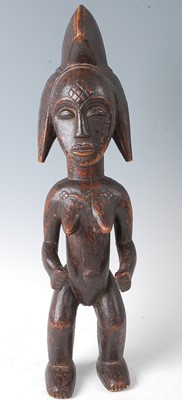 Lot 61 - An ancestor figure, carved as a nude female in...
