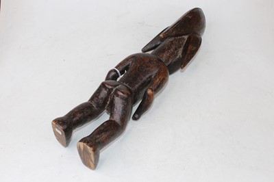 Lot 61 - An ancestor figure, carved as a nude female in...