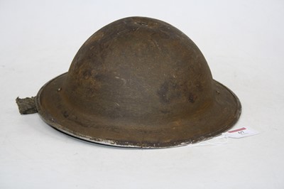 Lot 67 - A WWII British steel helmet, dia.34cm