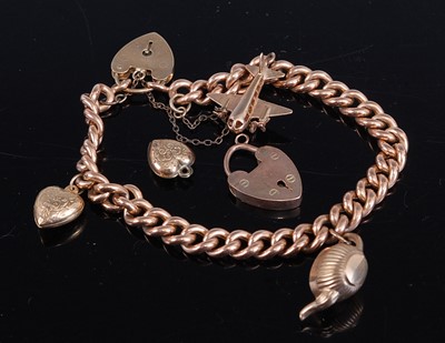 Lot 324 - A 9ct gold hollow curb link bracelet with...