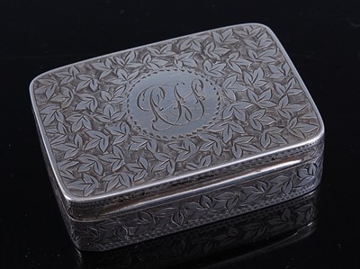 Lot 339 - A silver snuff box having bright cut leaf...