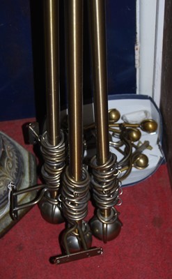 Lot 1106 - Three brushed metal curtain poles, having...