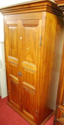 Lot 1116 - A contemporary hardwood twin recessed panelled...