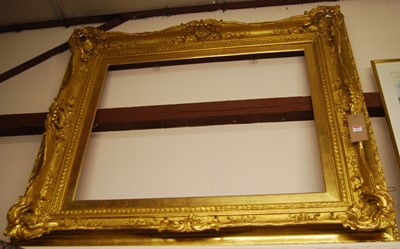 Lot 1027 - A reproduction gilt composition swept picture...