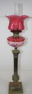 Lot 115 - A Victorian pedestal oil lamp, having a...
