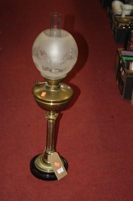 Lot 118 - A Victorian brass pedestal oil lamp, having...