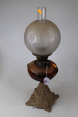 Lot 130 - A Victorian pedestal oil lamp, having etched...