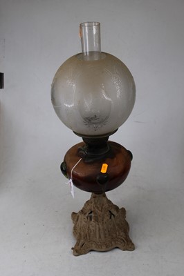 Lot 130 - A Victorian pedestal oil lamp, having etched...
