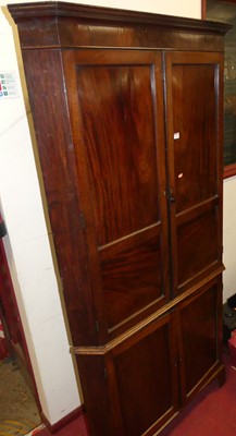 Lot 1136 - A 19th century mahogany freestanding four-door...