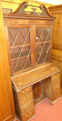 Lot 1167 - A George III mahogany bookcase cabinet,...