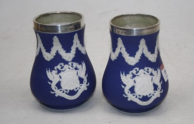 Lot 166 - A pair of Adams dark blue jasper ware armorial...