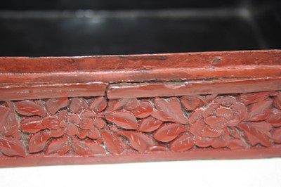 Lot 172 - A Chinese cinnabar lacquer table box and cover,...