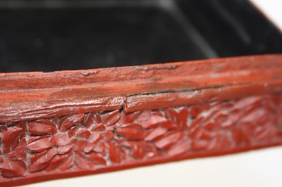 Lot 172 - A Chinese cinnabar lacquer table box and cover,...
