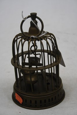Lot 180 - A miniature gilt metal wirework birdcage,...