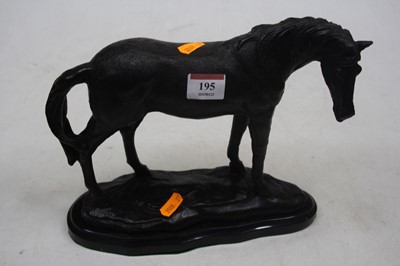 Lot 195 - A reproduction bronze model of a standing...