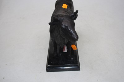 Lot 197 - A reproduction bronze model of a standing bull...