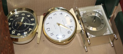 Lot 163 - A 1920s oak cased mantel clock having a...