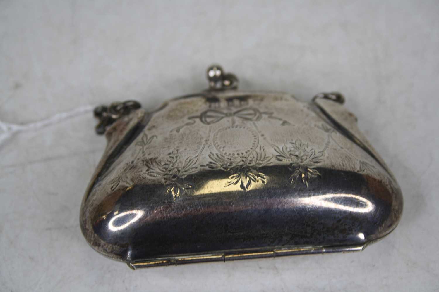 Lot 250 - A George V ladies silver purse engraved with...