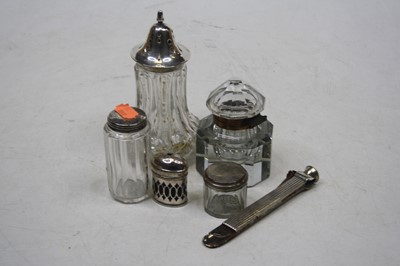 Lot 223 - A faceted glass scent bottle and stopper;...