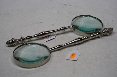 Lot 227 - A pair of reproduction silver plated...