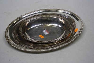 Lot 233 - A pair of graduated EPNS oval meat platters;...