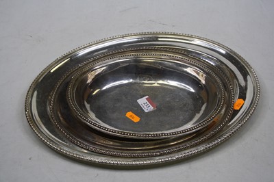Lot 233 - A pair of graduated EPNS oval meat platters;...