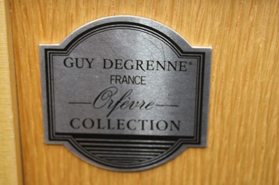 Lot 235 - A Guy Degrenne of France 12-place setting...