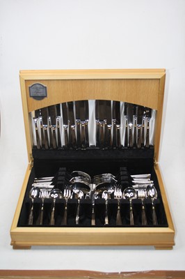 Lot 235 - A Guy Degrenne of France 12-place setting...